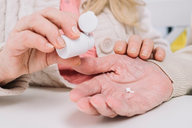 Senior couple using pills