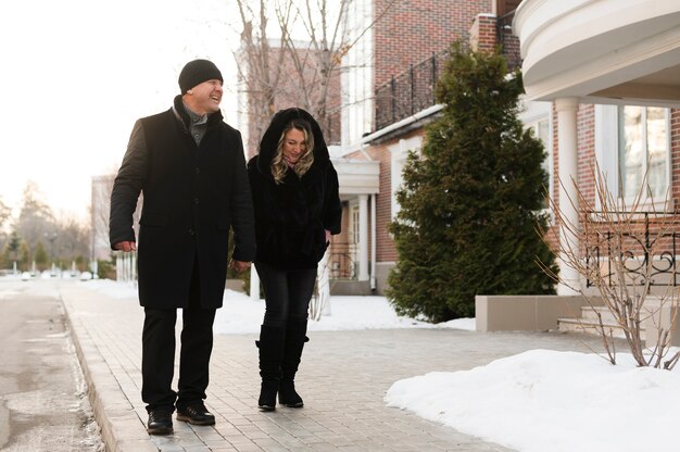 Senior couple walking in the neighbourhood