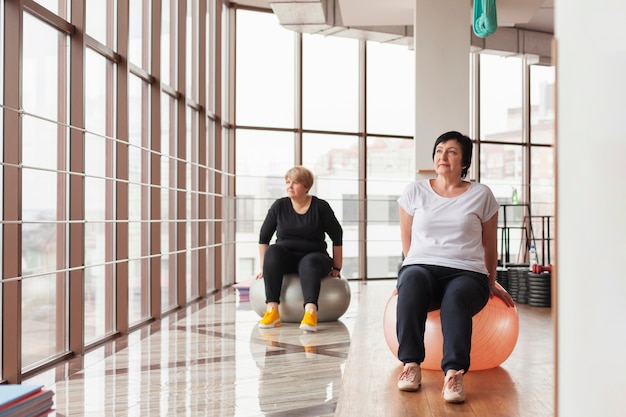 Senior couple working with balls