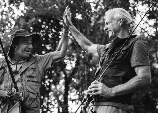 Senior friends give high five