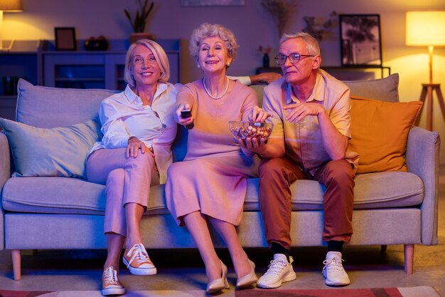 Senior friends having a party at night