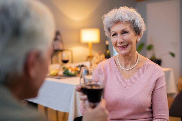 Senior friends having a party at night