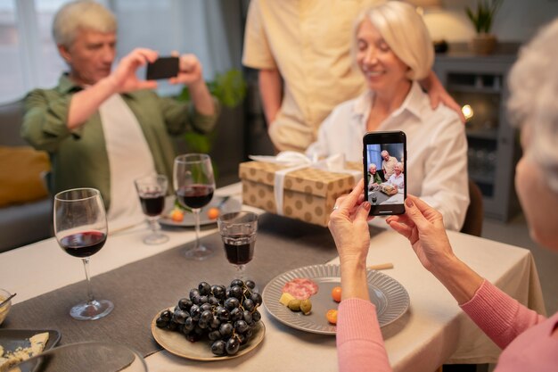 Senior friends having a party at night