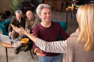 Free photo senior friends having a wonderful time together