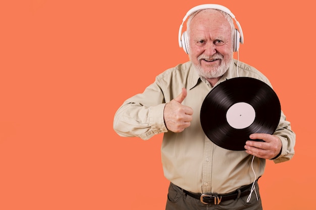 Senior likes music records with copy-space