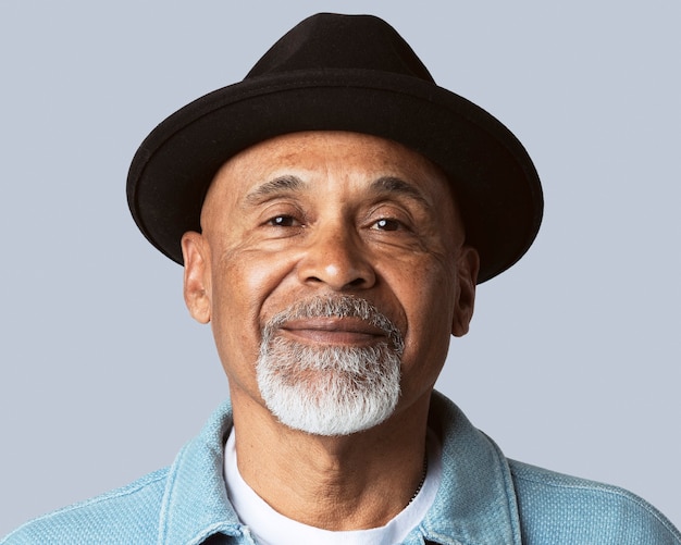 Senior man face portrait, wearing bowler hat