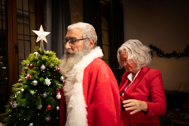 Senior man getting ready for christmas