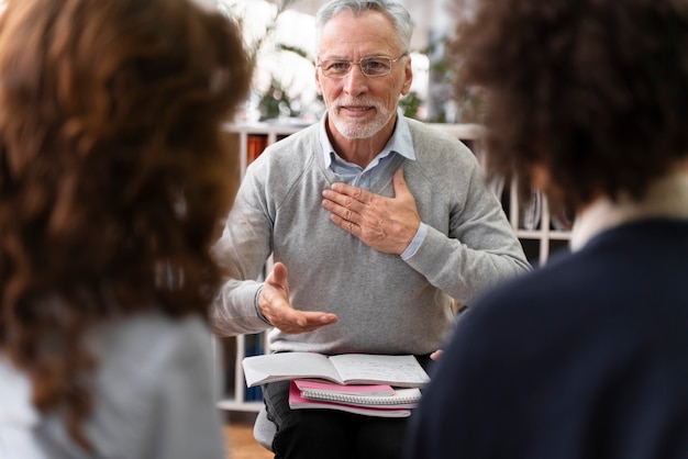 Free photo senior man sign language close up