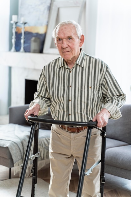 Senior man standing indoors