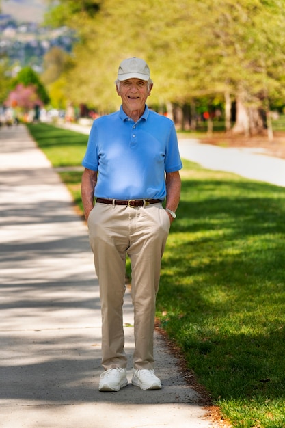 Free photo senior man taking a walk outdoors in the city