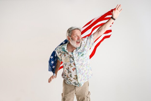 Senior man with the flag of United States of America