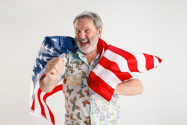 Senior man with the flag of United States of America