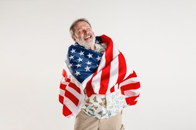 Senior man with the flag of United States of America