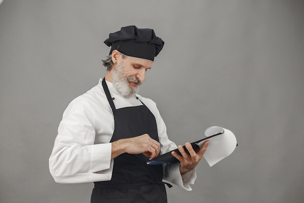 Senior man with folder.  Professional approach to business.