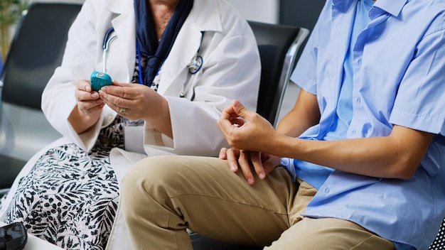 senior-medic-measuring-insulin-level-glucose-using-glucometer-taking-blood-sample-during-examination-with-asian-patient-with-diabetes-specialist-doing-medical-test-hospital-reception_482257-61692.jpg