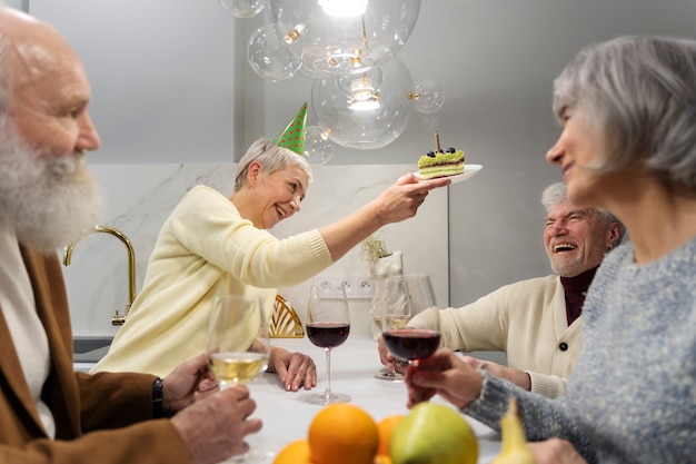 Senior people celebrating together