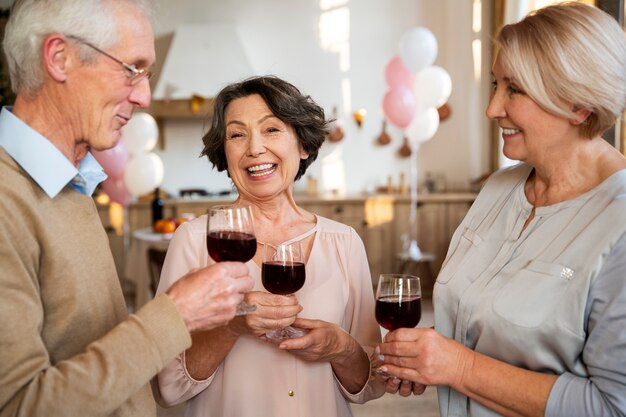 Senior people having fun at party