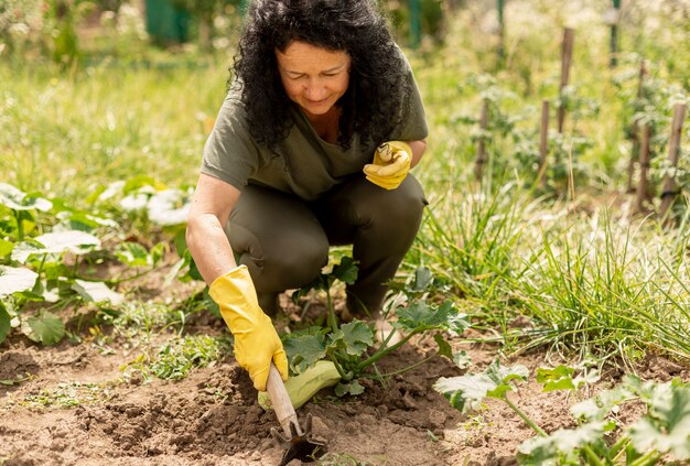 senior woman caring the crops
