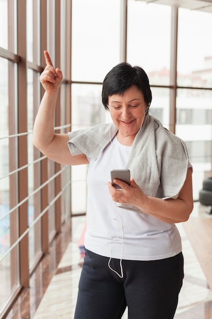 Senior woman checking mobile