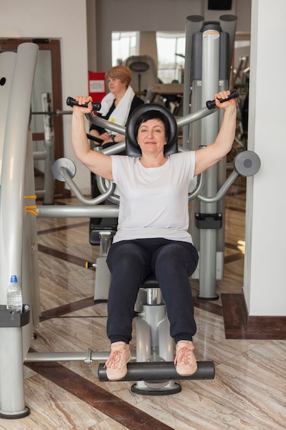 Free photo senior woman exercising