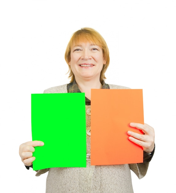 senior woman holding empty red and green posters