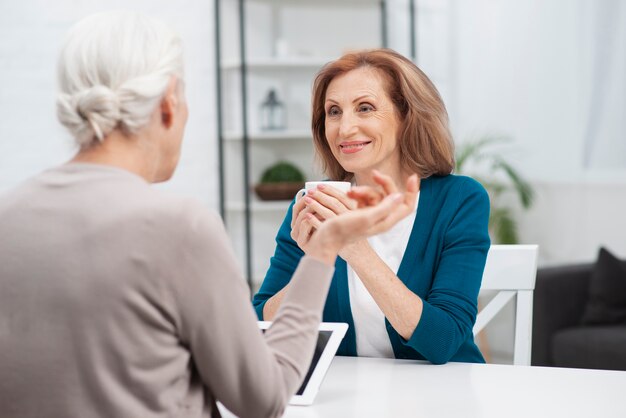 Senior woman looking at her friend