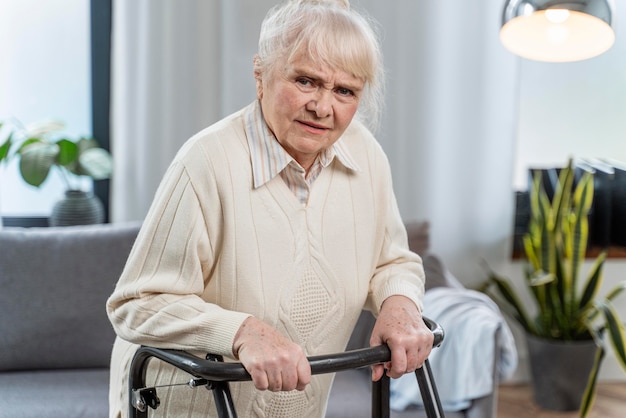 Free photo senior woman standing indoors