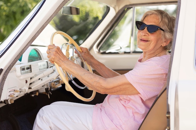 Free photo senior woman traveling alone