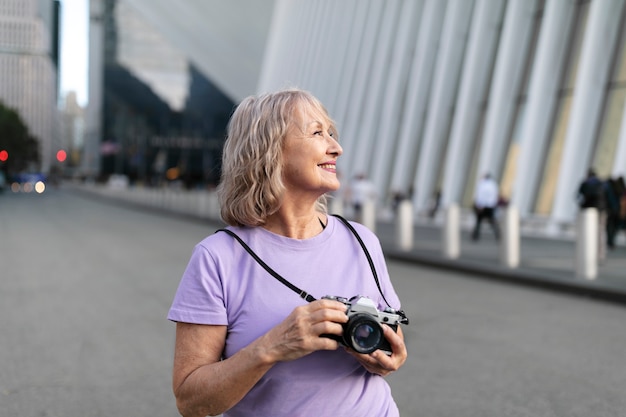 Senior woman traveling areound the world