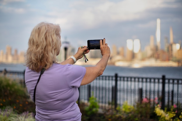 Senior woman traveling areound the world