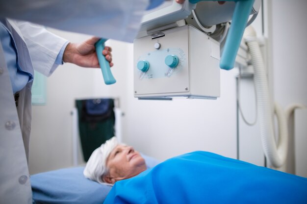 Senior woman undergoing an x-ray test