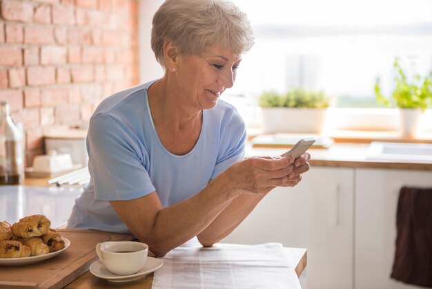 Senior woman using her mobile phone