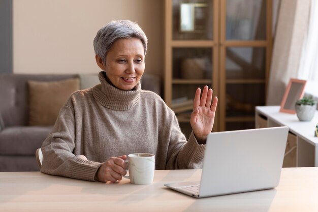 Senior woman video conferencing