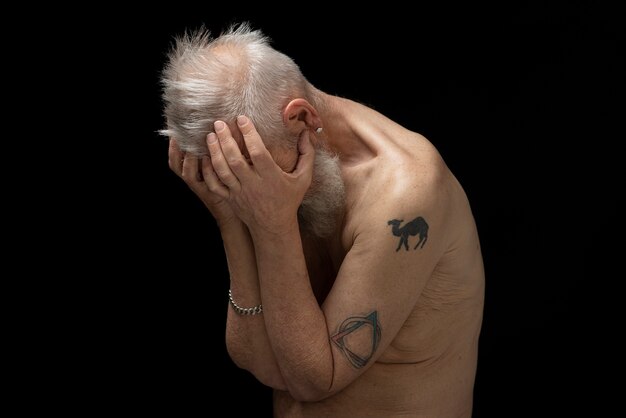 Sensitive old man portrait in studio