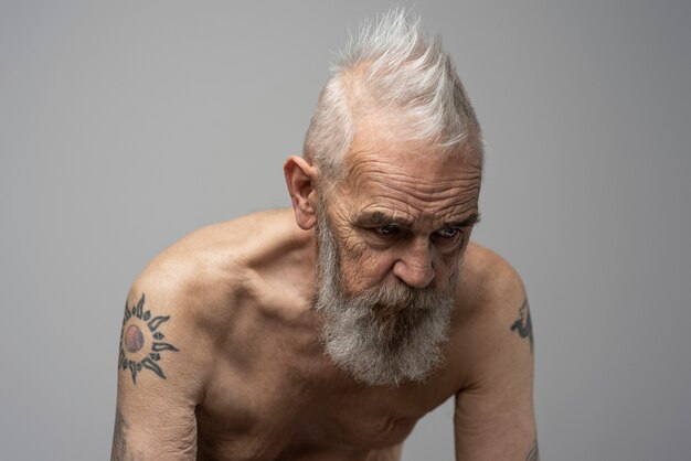 Sensitive old man portrait in studio