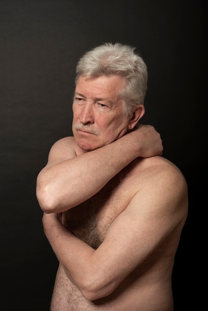 Sensitive old man portrait in studio