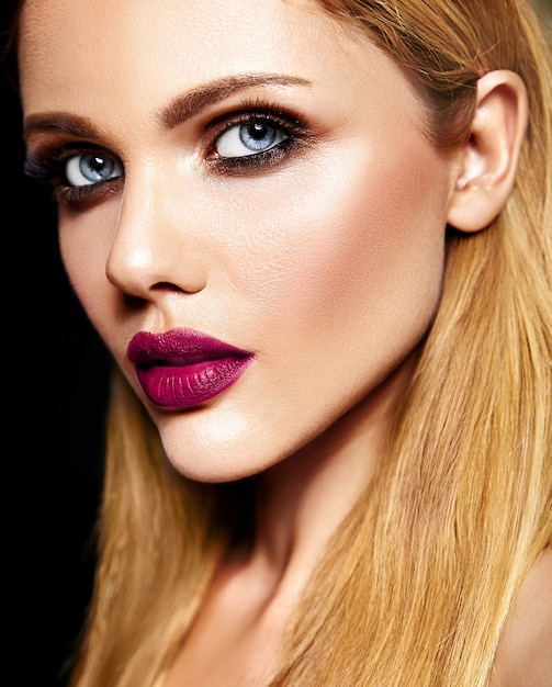 sensual glamour portrait of beautiful blond woman model lady with fresh daily makeup with purple lips color and clean healthy skin