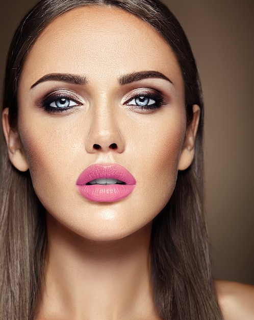 sensual glamour portrait of beautiful  woman model lady with fresh daily makeup with pink lips color and clean healthy skin face