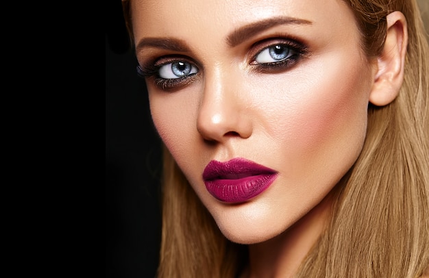 sensual glamour portrait of beautiful woman model with fresh daily makeup with dark pink lips color and clean healthy skin face