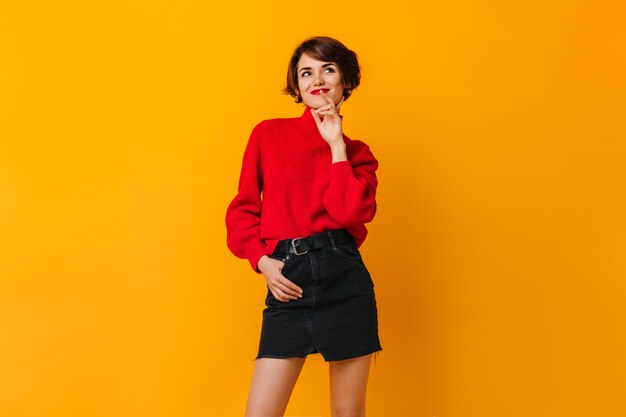 Sensual woman in skirt looking at front