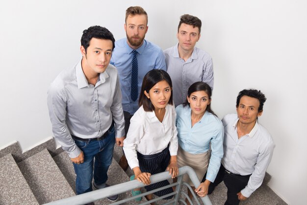 Serious Business Colleagues Gathering on Stairs