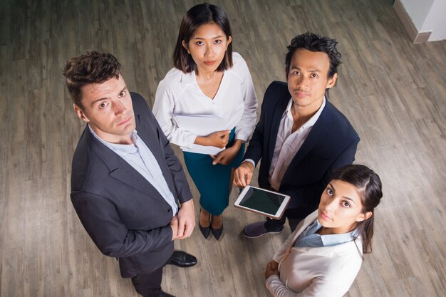 Serious Business Team Gathering in Office Hall