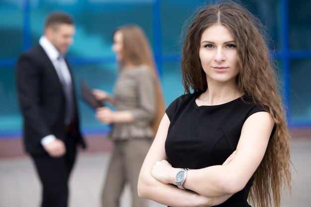 Serious businesswoman with long hair