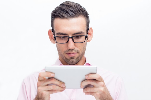 Serious Handsome Business Man Using Tablet