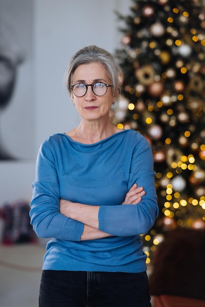 Serious mature woman  looking at camera