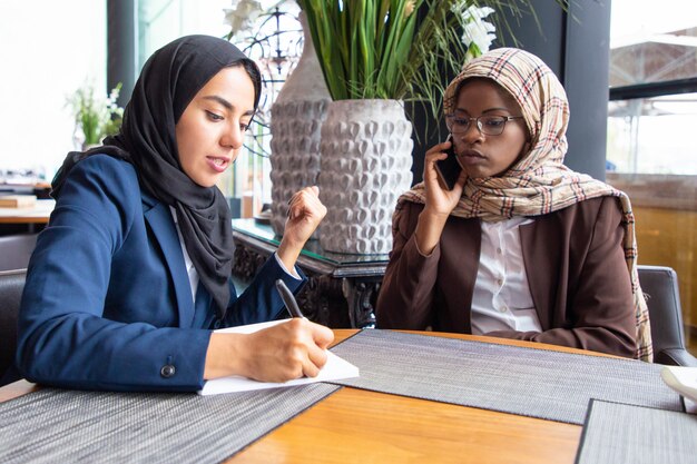 Serious Muslim African American businesswoman