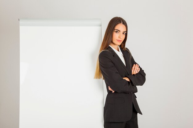 Serious professional woman and whiteboard