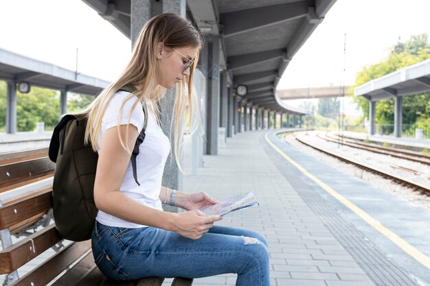 Serious woman looking at a map