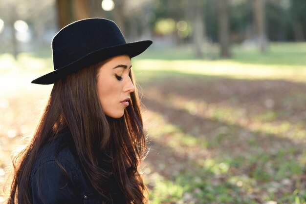 Serious woman with closed eyes