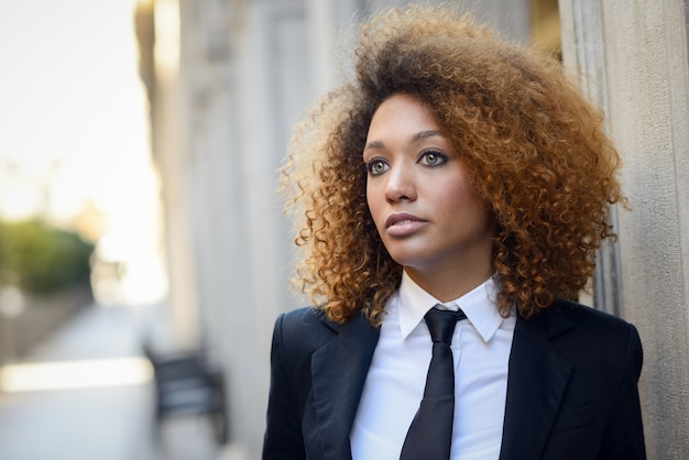 Free photo serious woman with jacket suit